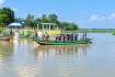 উত্তাল পদ্মায় দুই সপ্তাহ ধরে ফেরি চলাচল বন্ধ, ঝুঁকি নিয়ে ট্রলারে পারাপার